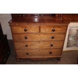 A 19th Century mahogany chest, of two short and three long graduated drawers, fitted turned ebony