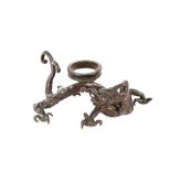An oriental bronze stand, in the form of a dragon, 15cm long