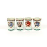 Four Chinese beakers, decorated with oval panels of dragons, six character marks to bases, (some