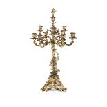 A large 19th Century ornate silver plated ten branch candelabra, decorated with cherubs and