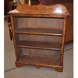 A Victorian walnut and boxwood strung open fronted bookcase, with adjustable shelves, 91cm wide x