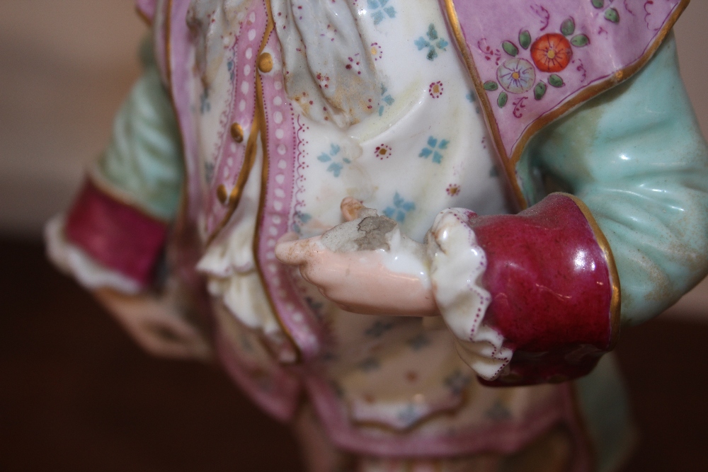 A pair of late 19th Century Meissen style figures, depicting maid and youth, raised on floral - Image 8 of 13