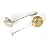 An Edwardian silver sifter spoon, London 1902; and another Birmingham 1904, (2)