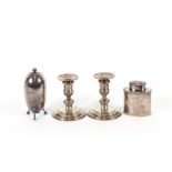 A pair of modern silver dwarf candlesticks, London 1972; a plated tea caddy and an Elkington &