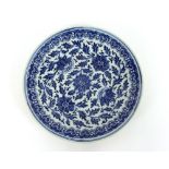Four various 19th Century Chinese blue and white plates, one with figure and dragon decoration