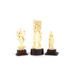 Three various early 20th Century Indian ivory carvings, of figures on ebonised plinth bases