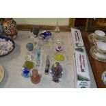 A collection of various coloured glass and other o