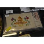 A WW1 silk embroidered patriotic post-card; and a