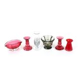 A pair of ruby glass candlesticks; a ruby glass ov