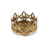A brass Gothic revival crown shaped coaster