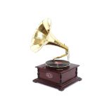 A wooden gramophone with brass horn, and 78rpm reocrd