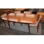 A David Joel Limited Art Deco design retro dining table, and four chairs with floral stamped fabric