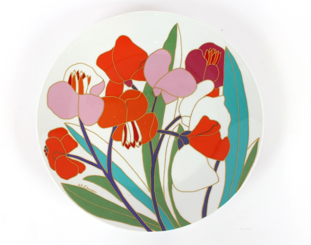 A Rosenthal plate, decorated with brightly coloure