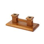 An Art Deco design wooden twin candle holder
