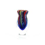 A heavy multicoloured Murano glass vase, raised on