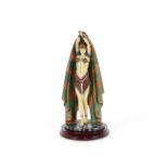 An Art Deco style figurine, depicting a lady with