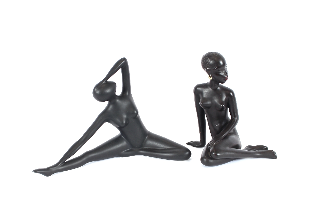 Two pottery figures, depicting naked ethnic ladies