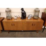 A G-plan design teak sideboard , fitted double cup