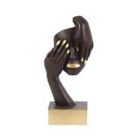 A bronze modern art face and hand ornament, 45cm h