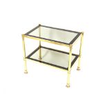 A brass and smoked glass two tier coffee table, 58