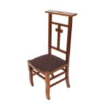 An early 20th Century oak prayer chair