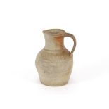 A stoneware baluster jug, 25cm high