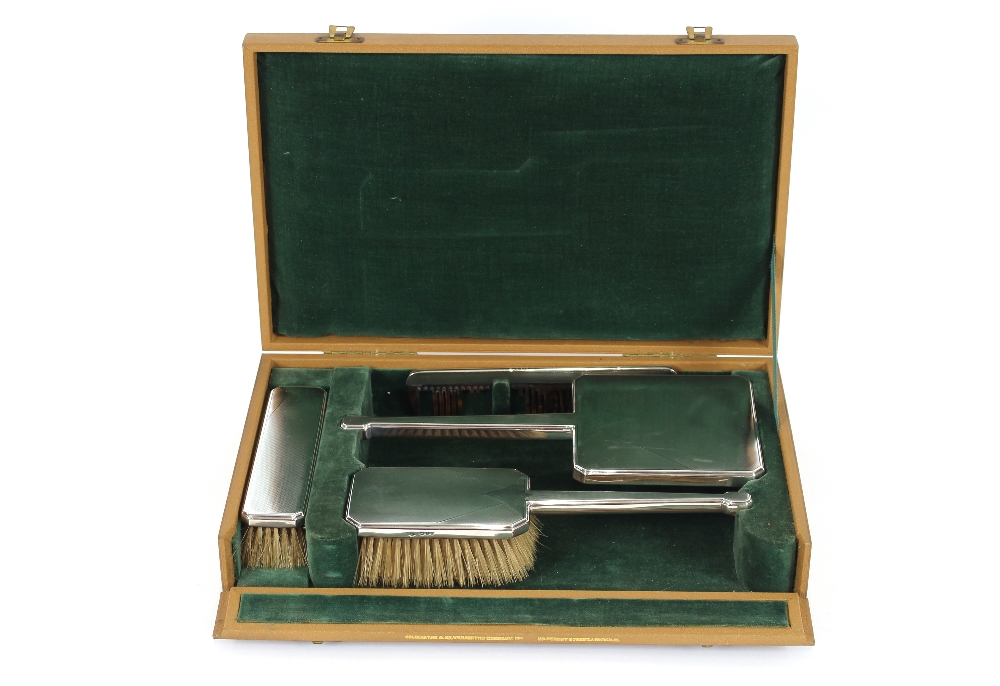 A silver dressing table set, by the Goldsmiths & S