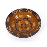 A Studio pottery glazed bowl, inscribed "Nu April