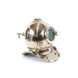 A chrome divers helmet