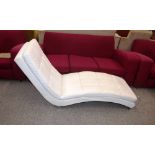 A white faux leather day bed, AF