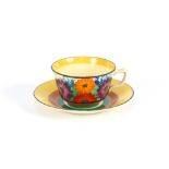 A Clarice Cliff "Gay Day" pattern cup and saucer