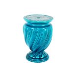 A Burmantofts style blue glazed jardiniere stand, 44cm h