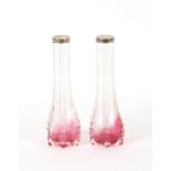 A pair of pink tinted glass and silver mounted spi