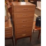 A teak effect narrow chest of six drawers, 52cm wi