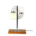 An Art Deco chrome and opaque glass table lamp, ra
