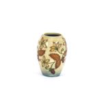 A Moorcroft baluster vase, decorated leaves and be