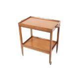 A teak two tier tea trolley, with reversible top