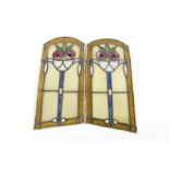 Two stained glass panels, with floral decoration