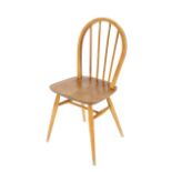 Three light Ercol stick back kitchen chairs