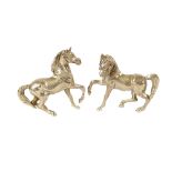A pair of plated horse ornaments, 13cm long