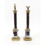 A pair of chrome and brass table lamp bases, 57cm