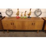 A G-plan teak sideboard, fitted double cupboards a