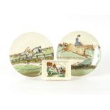 A pair of French pottery plates, decorated with hu