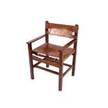 A teak and leather upholstered desk chair, raised