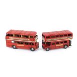 Two red London bus models