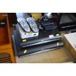 Two Sky HD boxes with remote controls etc.