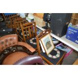 A set of four oak slat back dining chairs