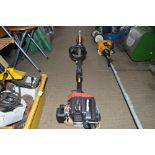 A Homelite petrol strimmer