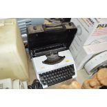 A typewriter in fitted case