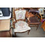 A floral upholstered elbow chair